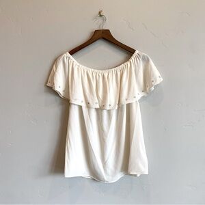 MICHAEL KORS Bone White Off Shoulder Ruffle Front Blouse With Gold Embellishment